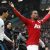 Evra festeja vitória na cara de Suarez