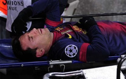Messi lesionado no joelho durante o jogo com o Benfica